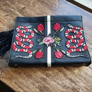 Kingsnake motif handbag